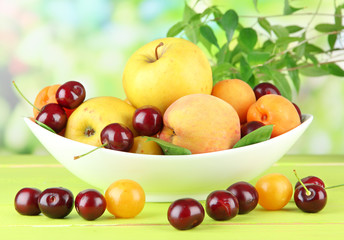 Bright summer fruits in plate