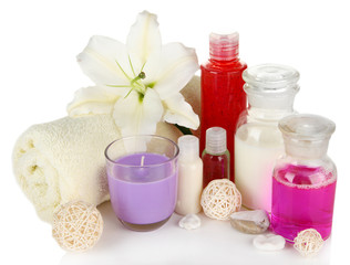 Beautiful spa setting with lily isolated on white