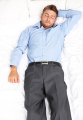 Fototapeta premium Handsome young man in bed