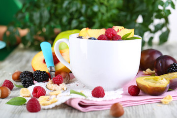 Oatmeal in cup with berries