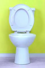 White toilet bowl in a bathroom