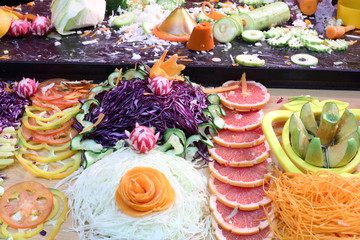 Beautifully cut colorful fresh vegetables and fruits