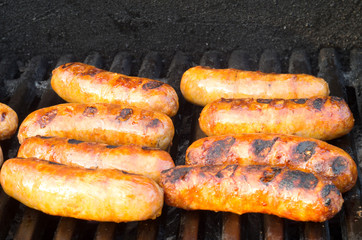 Italian sausages on grill