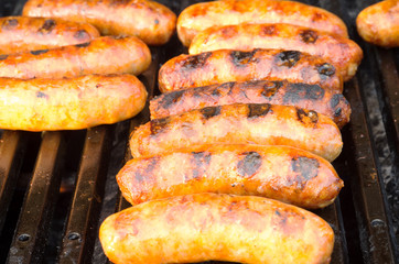 Italian sausages on grill