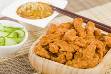 Malaysian style spicy chicken, peanut sauce and cucumber.