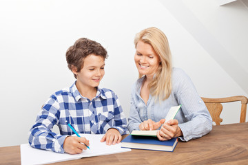 Mother and son studying