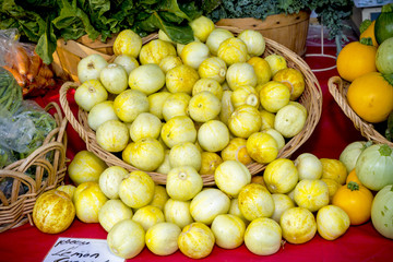 Yellow lemon squash in a basket at a market