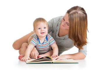 Fototapeta premium mother reading a book to baby boy