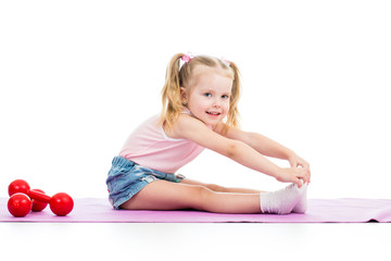 Obraz na płótnie Canvas Child girl doing fitness exercises