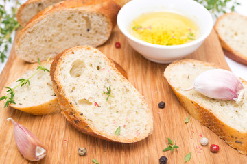 baguette with herbs, olive oil, spices, garlic