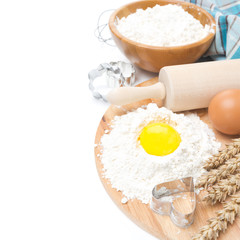 baking ingredients - flour, egg and baking forms, isolated