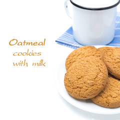 oatmeal cookies on the plate and mug of milk isolated, close-up