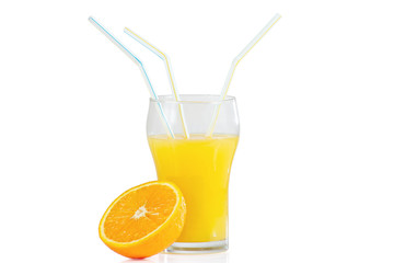Glass of fresh citrus juice with three straws and orange
