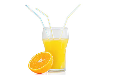 Glass of fresh citrus juice with three straws and orange