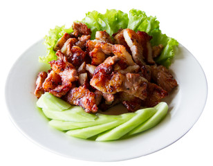 Roast beef and cucumber on a white dish
