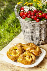 Homemade cookies on wooden table. Bouquet of autumn plants