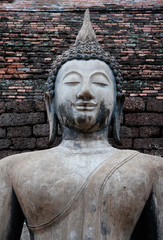 Big Buddha smiling faces