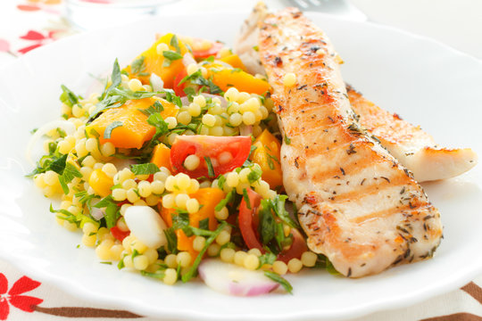 Grilled chicken with couscous salad