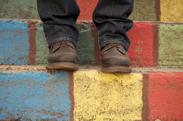 Man on colorful stairs