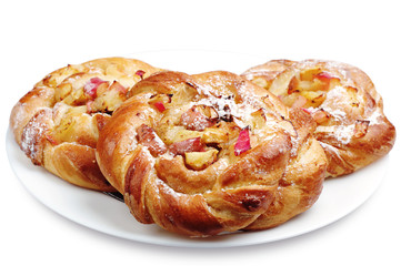 Three sweet buns with apple