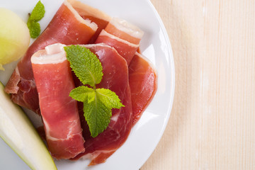 Melon and prosciutto - background