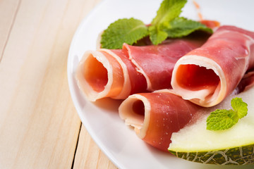 Melon and prosciutto - background