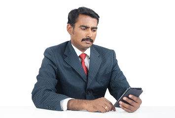 Indian Businessman with Cellphone