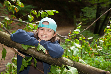 Happy girl in a forest