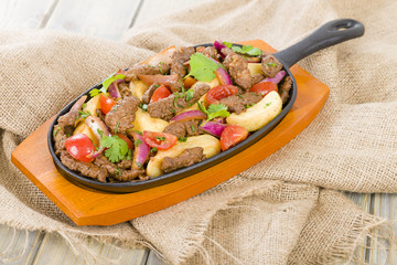 Lomo Saltado - Traditional Peruvian beef stir-fry.