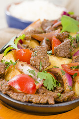 Lomo Saltado - Traditional Peruvian beef stir-fry.