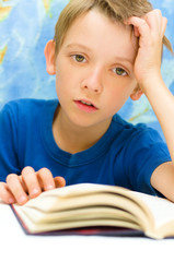 boy reading a book