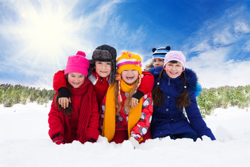Five happy laughing kids, winter