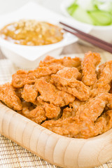Malaysian style spicy chicken, peanut sauce and cucumber.