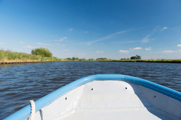 Blue boat on river