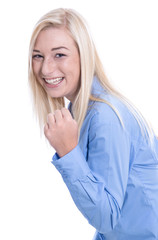 Lachendes blondes Mädchen isoliert mit Bluse in Blau