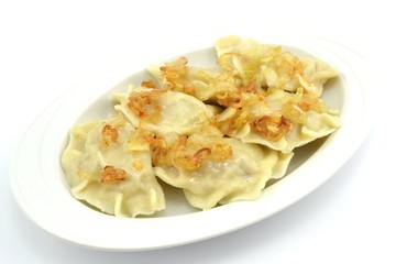 dumplings with meat, cabbage and onion