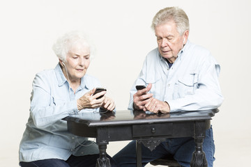 Senior couple listens to music