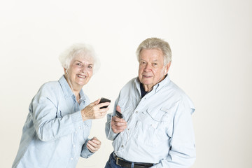 Senior couple listens to music
