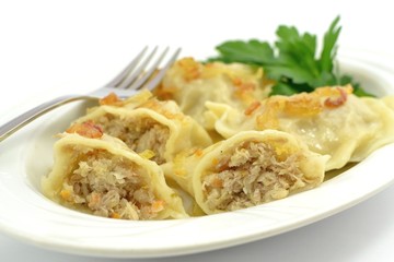 dumplings with meat, cabbage and onion