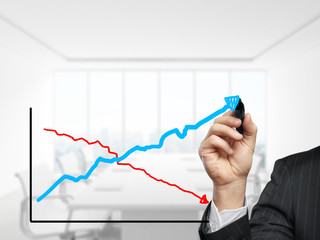 man drawing graph