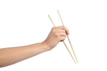 Woman hand using a chopsticks
