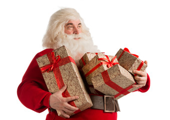 Portrait of Santa Claus with giftboxes looking away