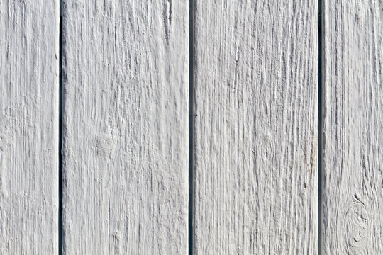Wooden surface painted with white finish in detail