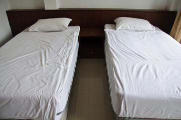 Two white bed