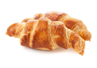 Croissants close-up isolated on white background