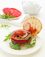 Homemade burger with barbecue sauce.