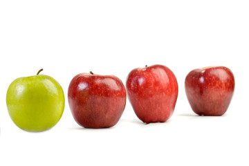 red apples and one green