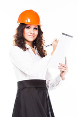 young beautiful woman in yellow construction helmet 