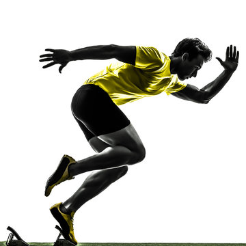 Young Man Sprinter Runner In Starting Blocks Silhouette