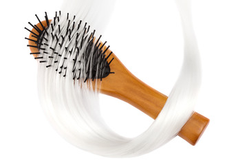 Wooden comb brush with hair